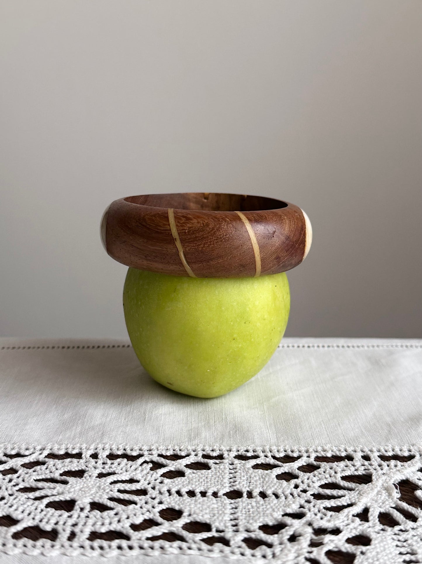 Vintage wooden bangle with born inlay