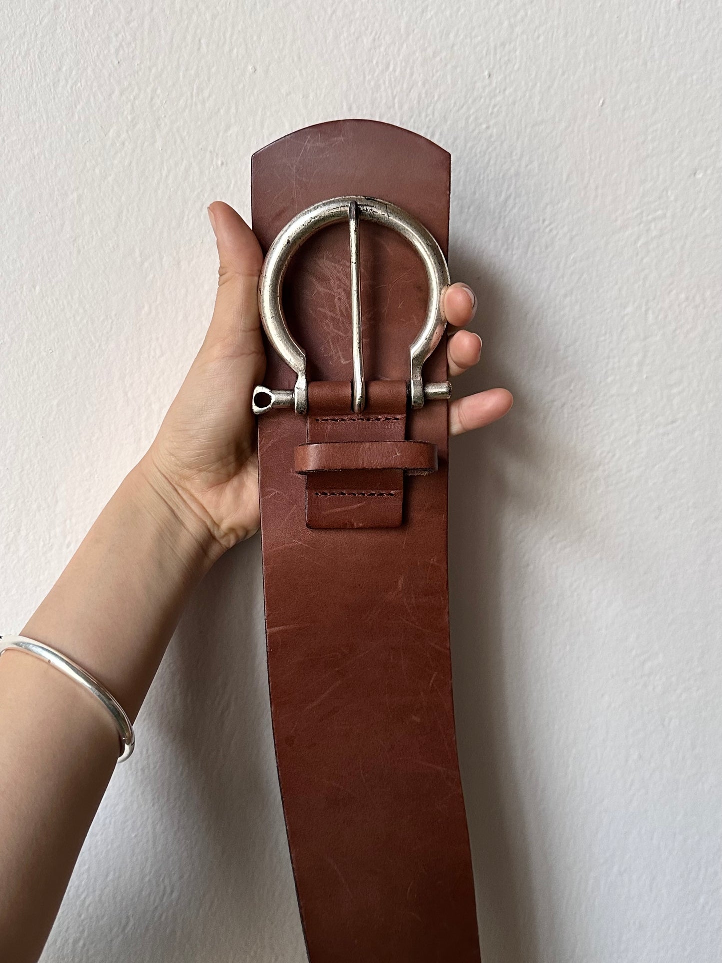 brown leather with shackle buckle belt