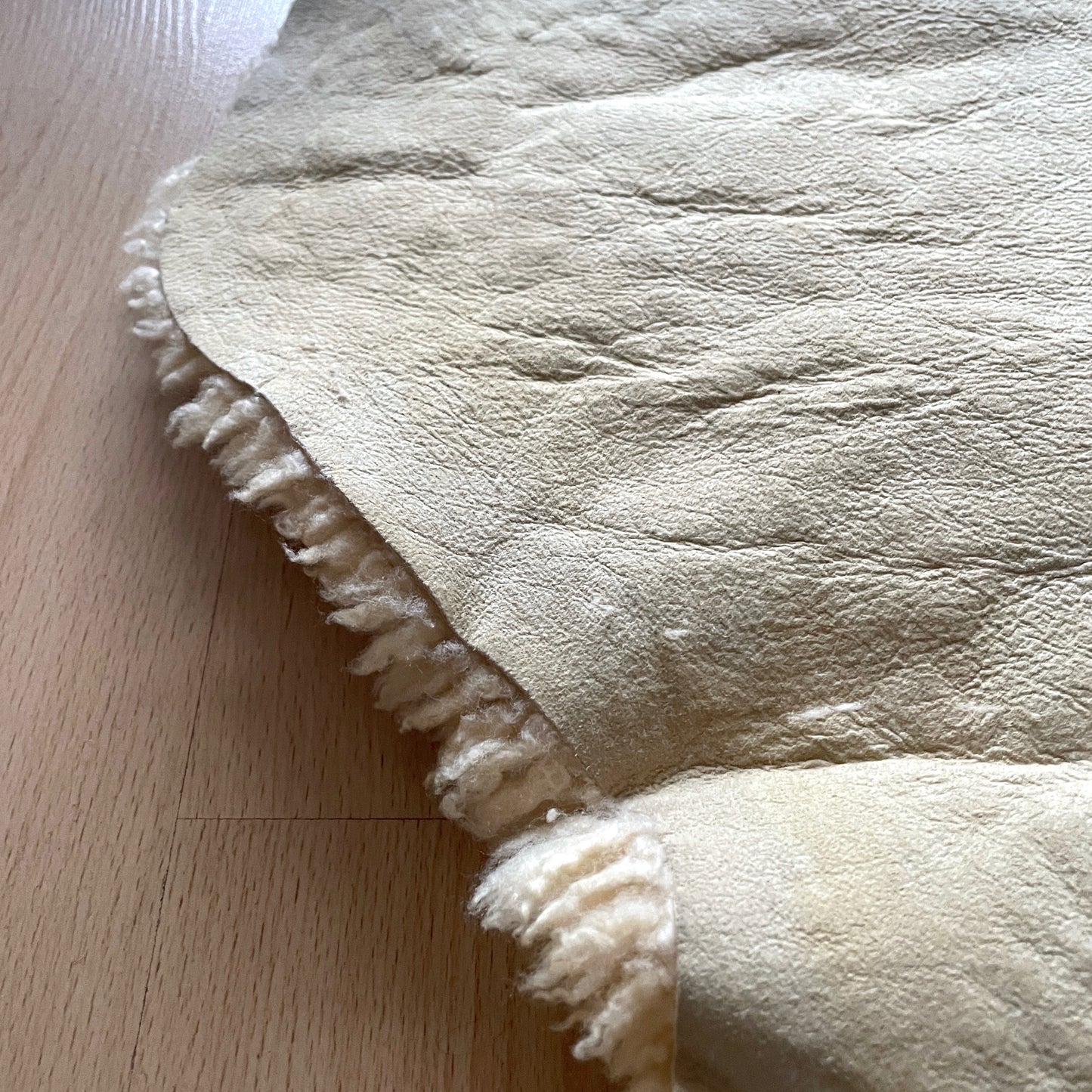 Beige long mouton rug