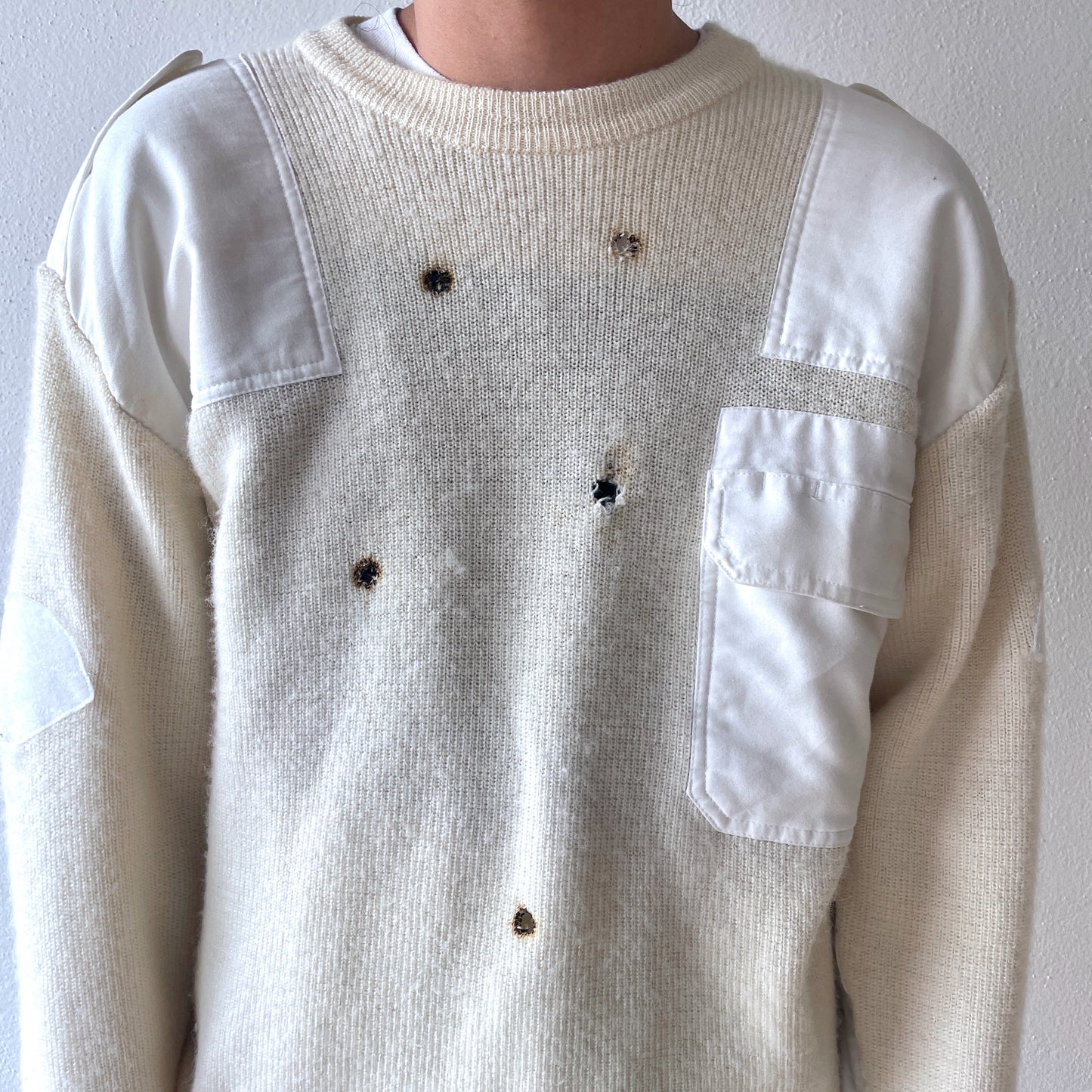 playful white sweater