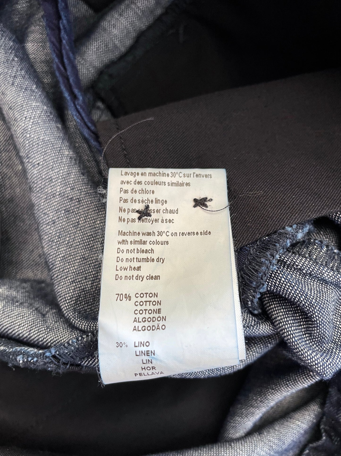 Italy two tuck denim slacks.