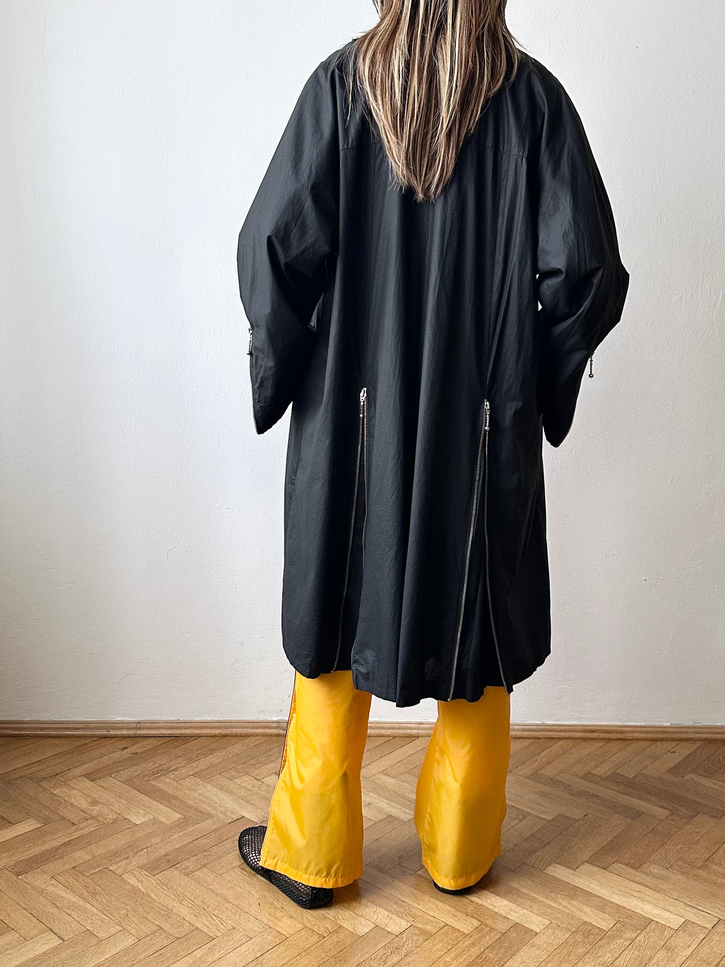 German black zip coat