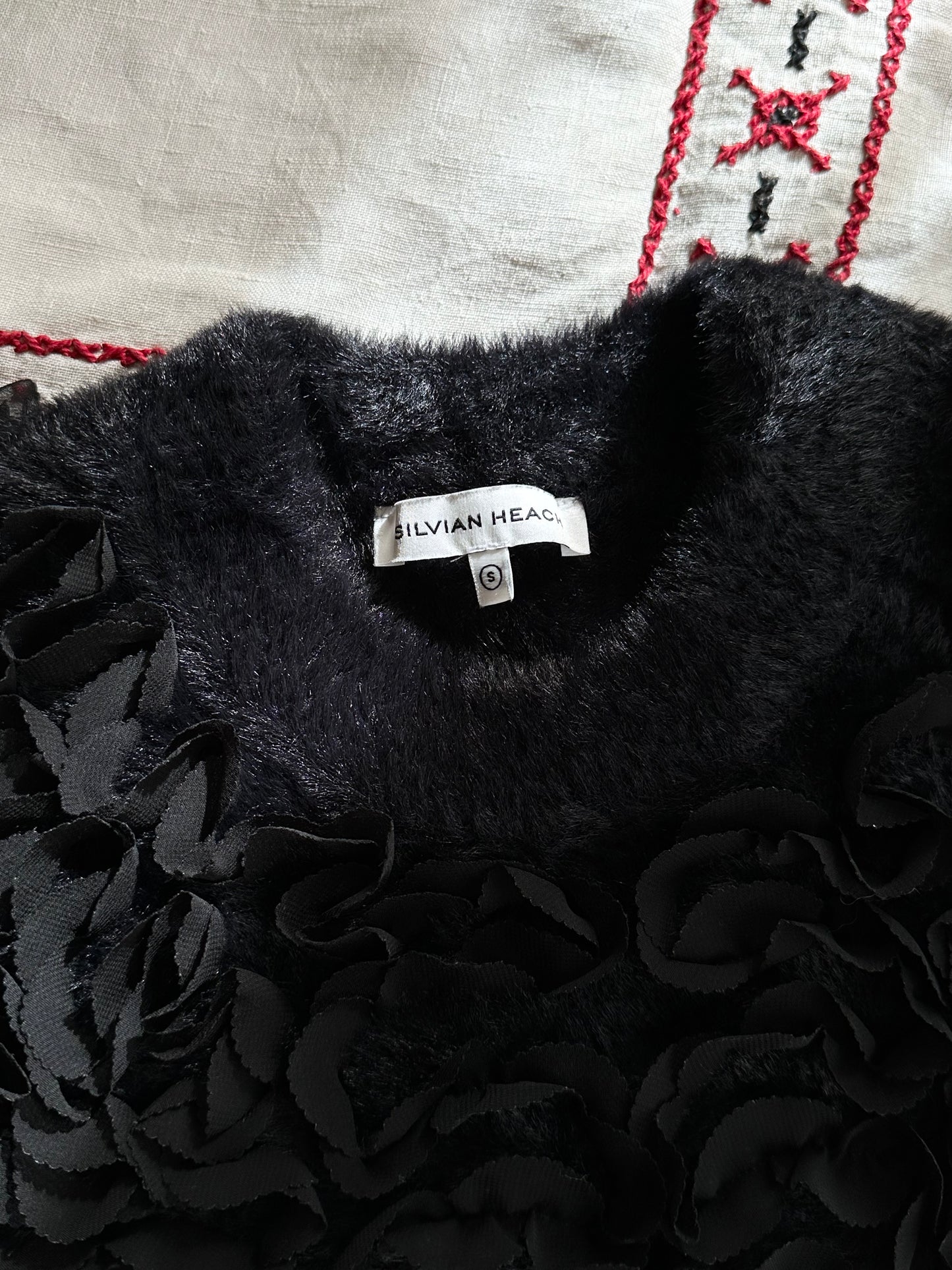 Black fur petals top