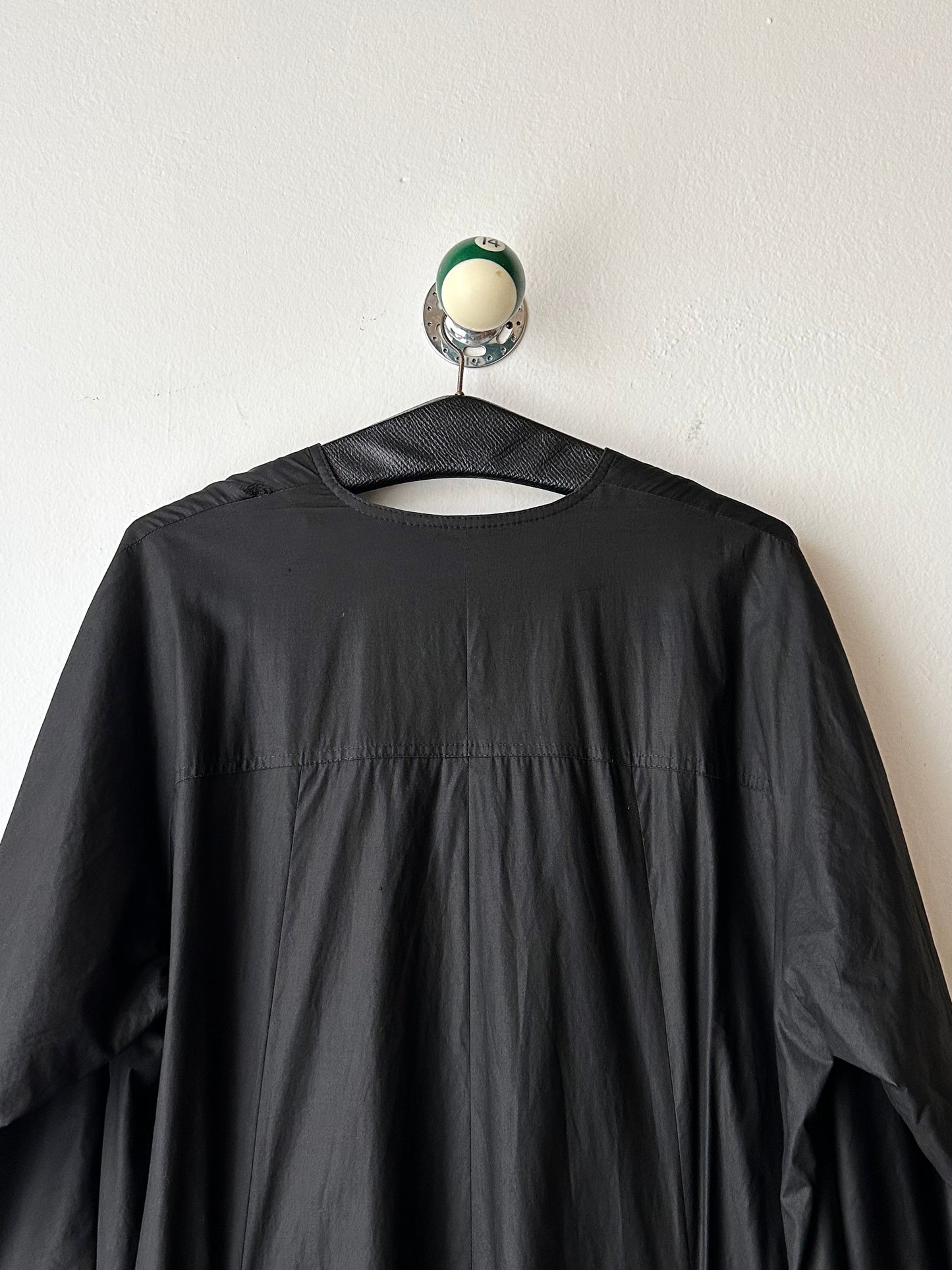 German black zip coat