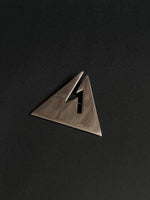 triangular brooch