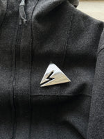 triangular brooch