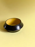 black and yellow wooden bangle