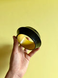 black and yellow wooden bangle