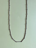 metal opera necklace