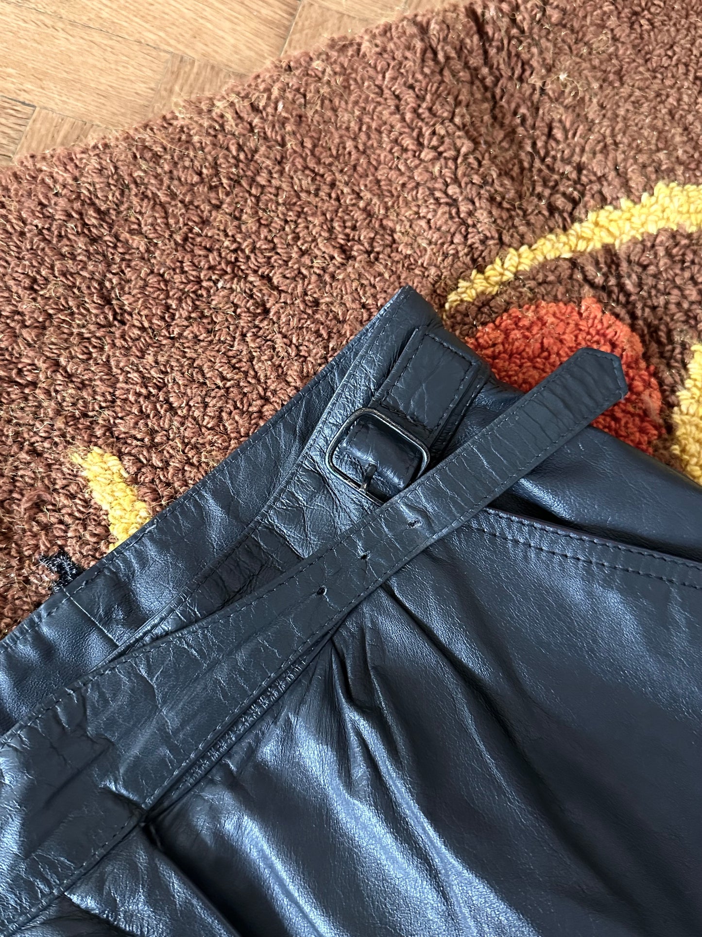 Grey leather trousers