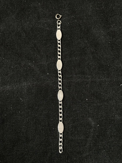 Silver tiny quirky bracelet