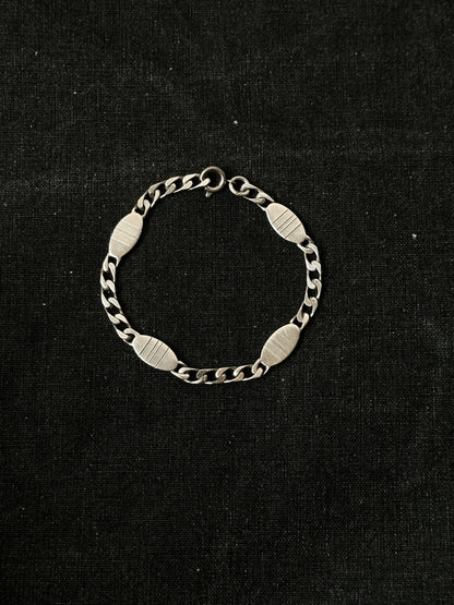 Silver tiny quirky bracelet