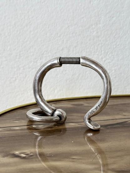 Rare 90s Uno de 50 silver plated metal spring bangle