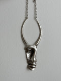 Brushed metal half face necklace