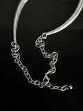 Brushed metal half face necklace