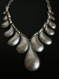 Brushed metal drop necklace