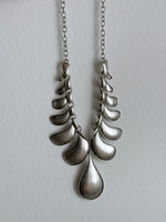 Brushed metal drop necklace