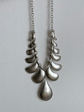 Brushed metal drop necklace