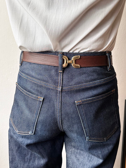 brown leather belt with gold buckle