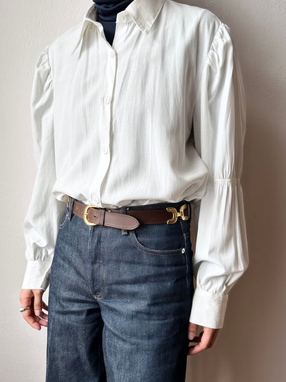 brown leather belt with gold buckle