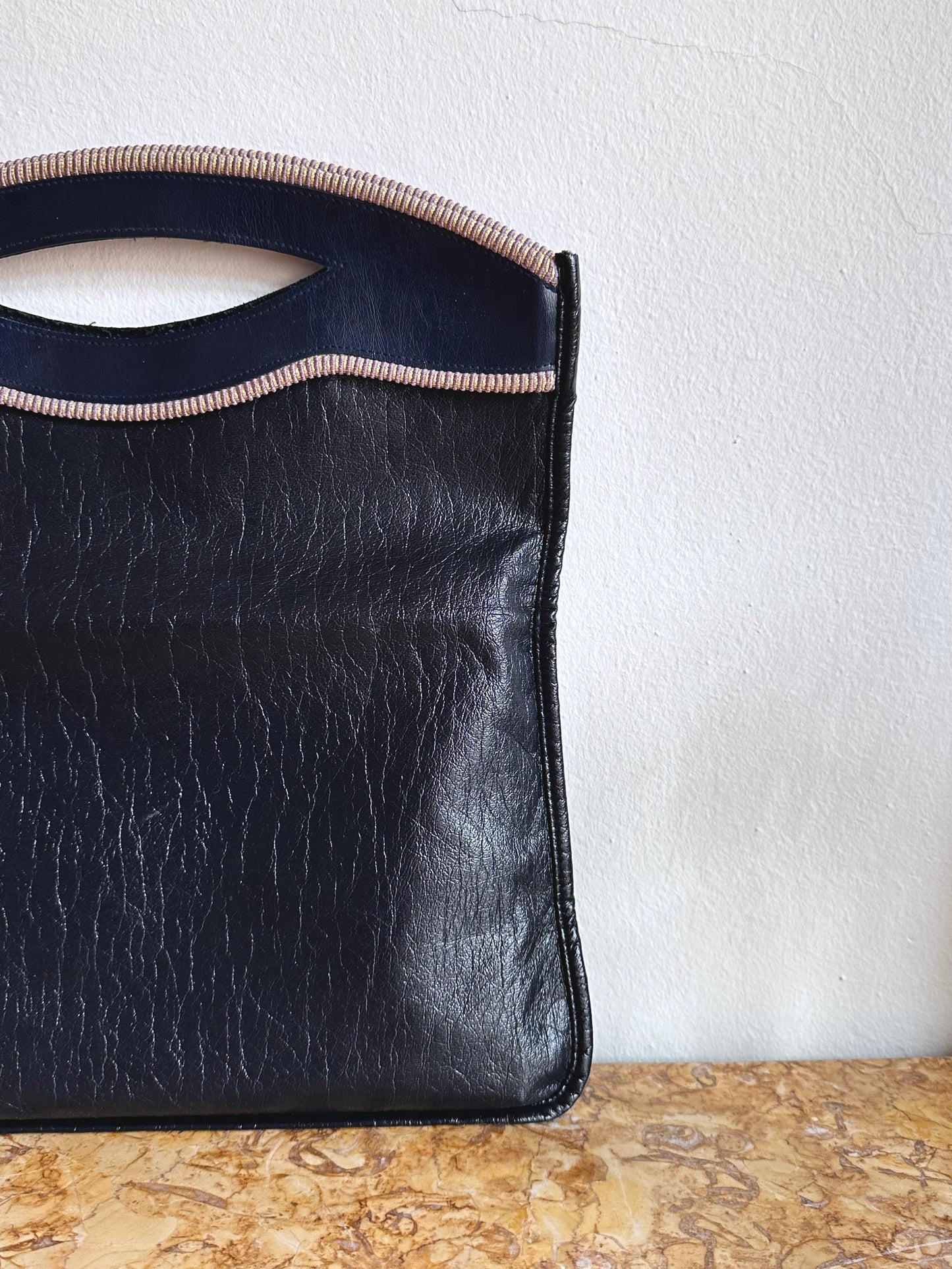 navy leather hand bag