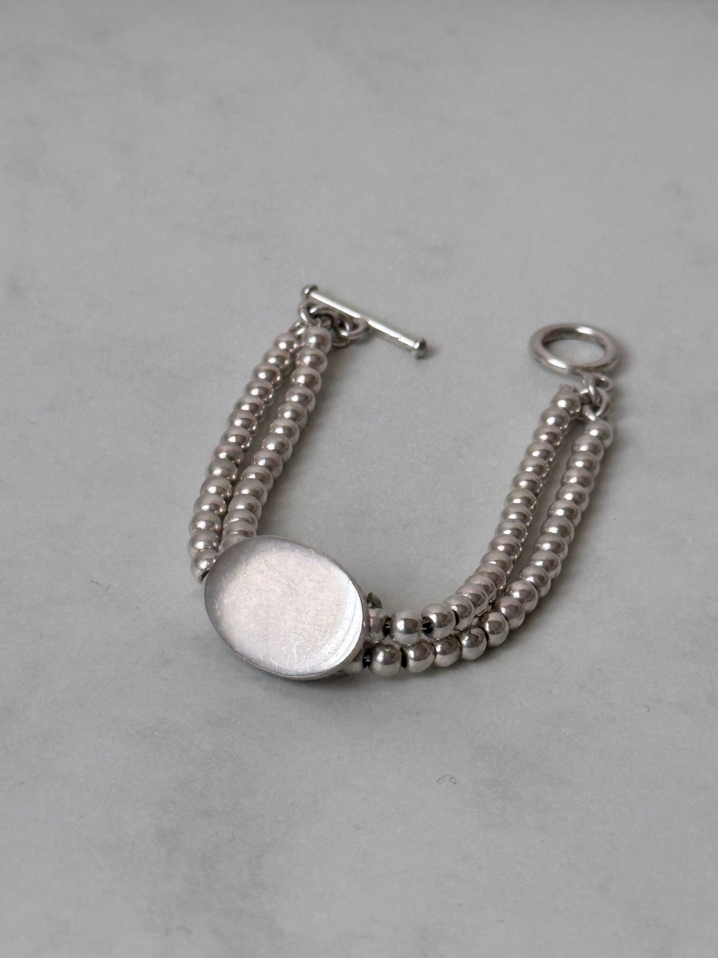 Vintage 925 ball rails with oval disc bracelet
