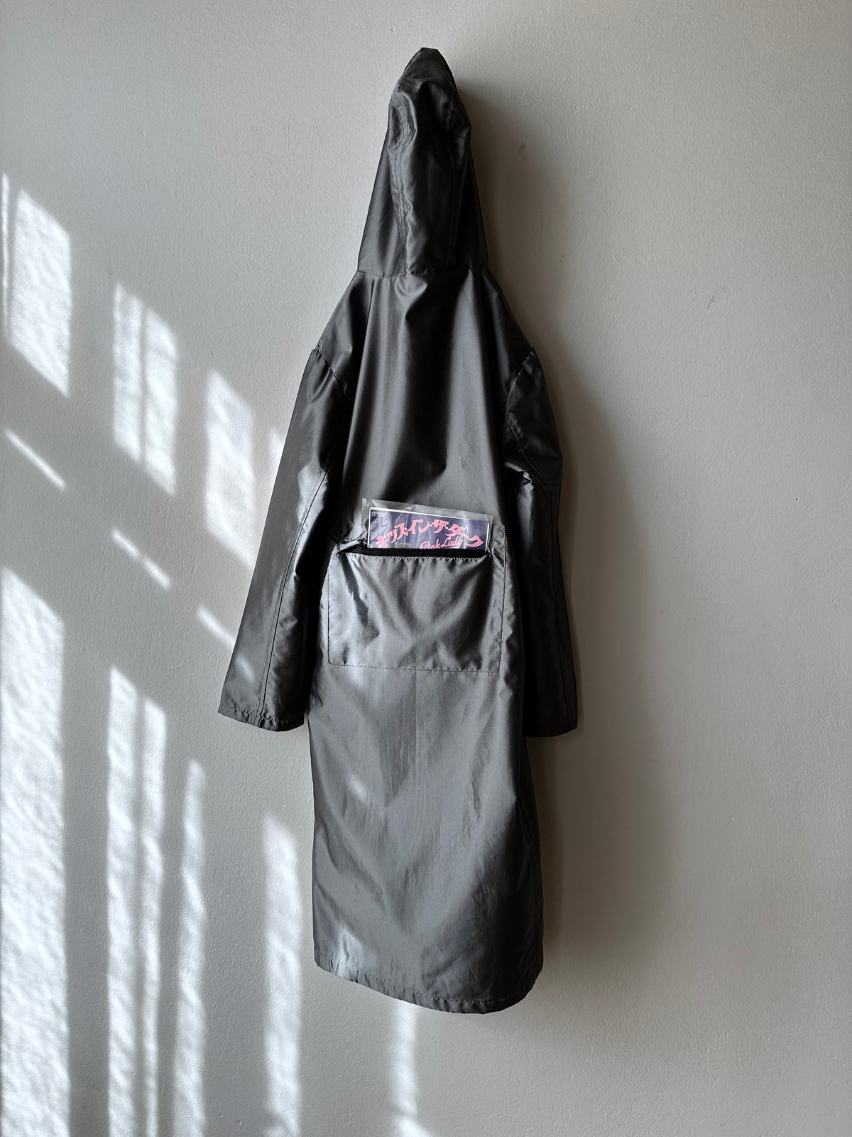 Metalic coat with back pocket