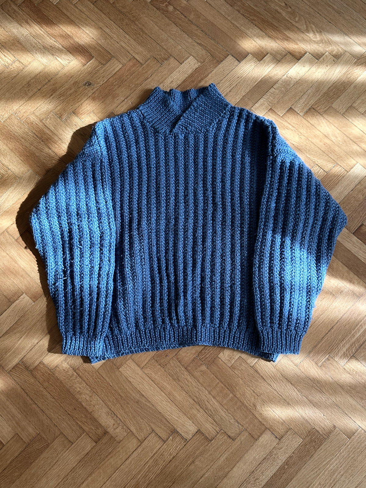 Handmade wool sweater in cloudy blue