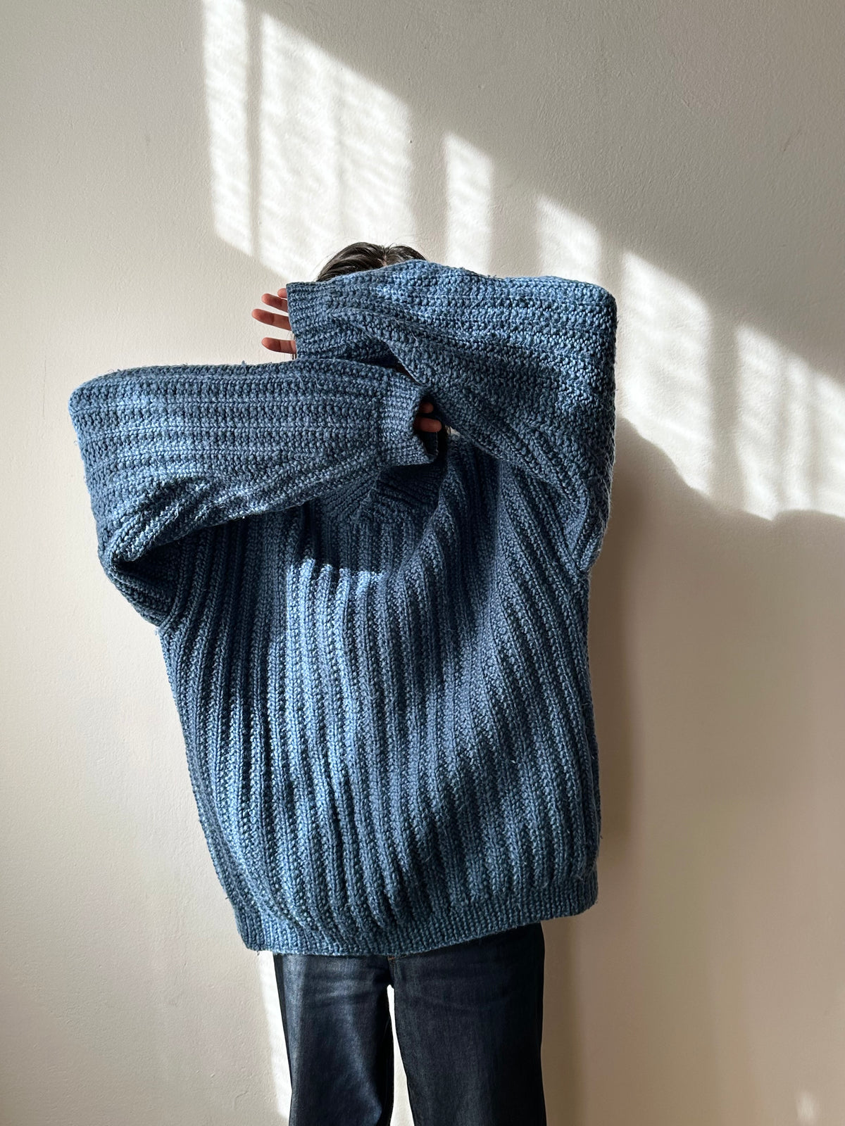 Handmade wool sweater in cloudy blue