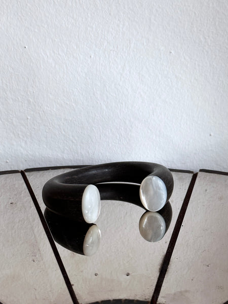 black wooden and mother of pearl bangle