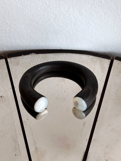 black wooden and mother of pearl bangle