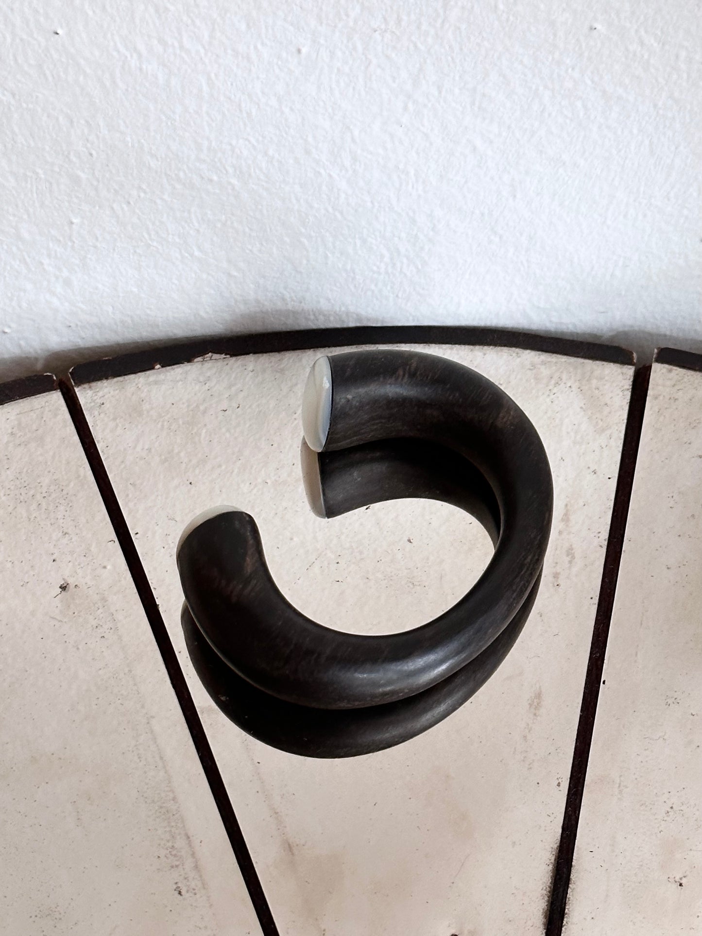 black wooden and mother of pearl bangle