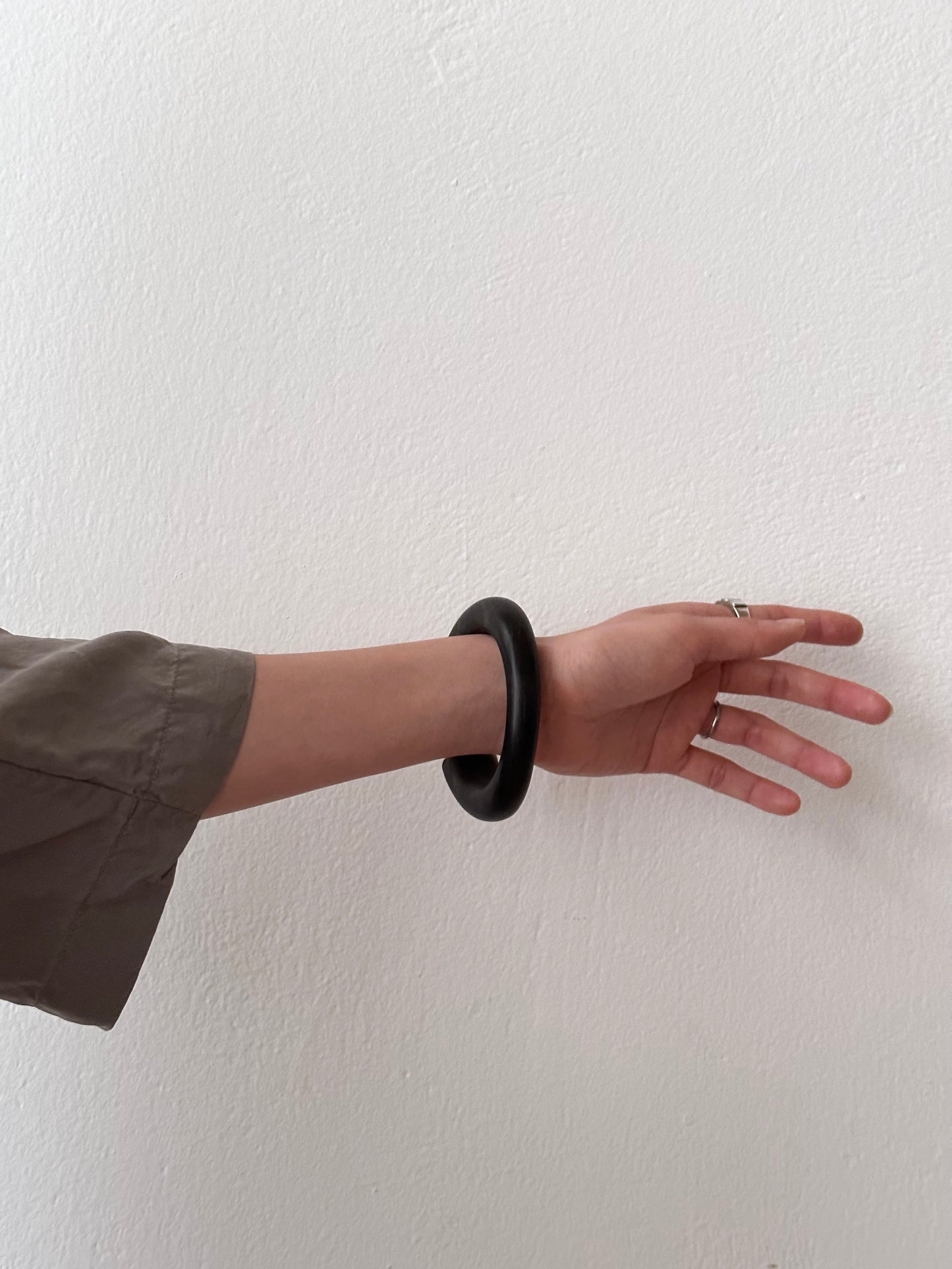 black wooden and mother of pearl bangle