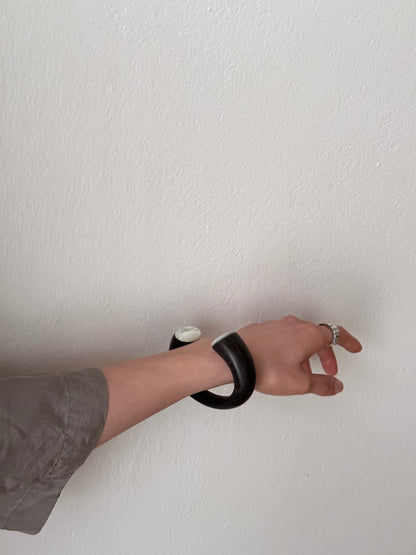 black wooden and mother of pearl bangle