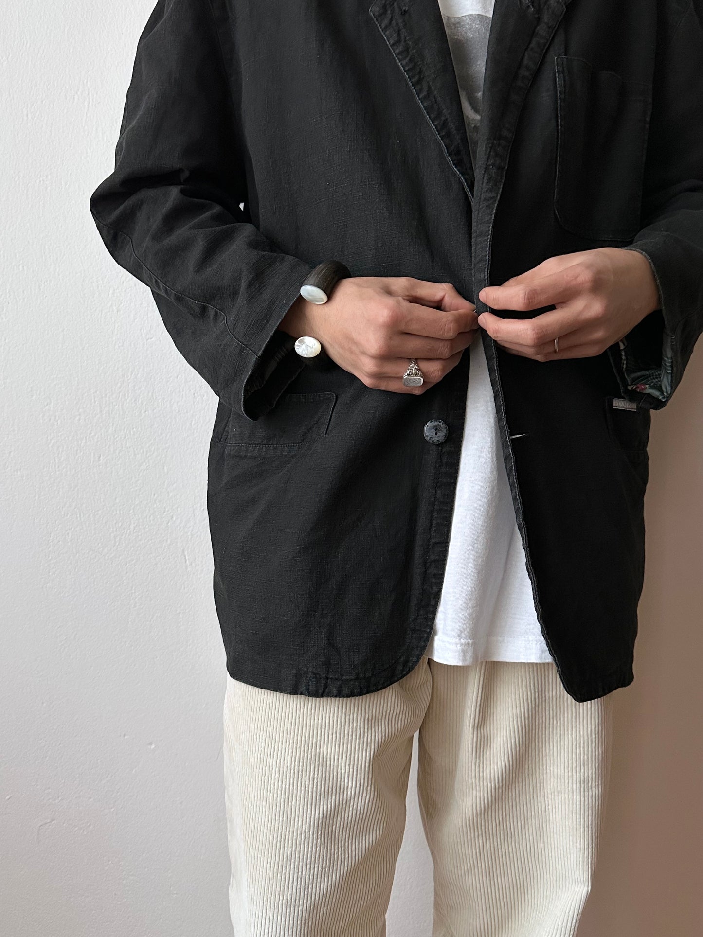 black wooden and mother of pearl bangle