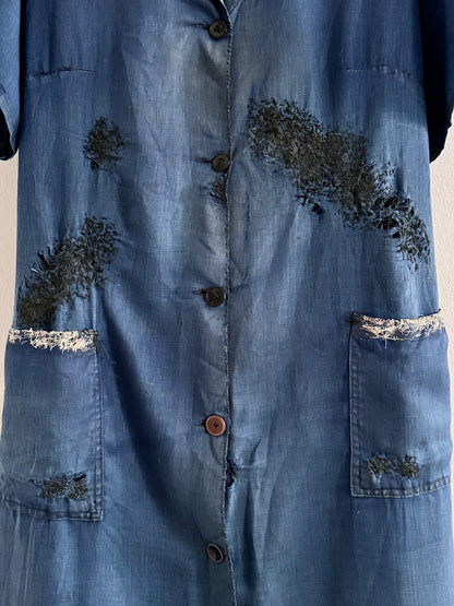 A work shirt with chaotic repairs