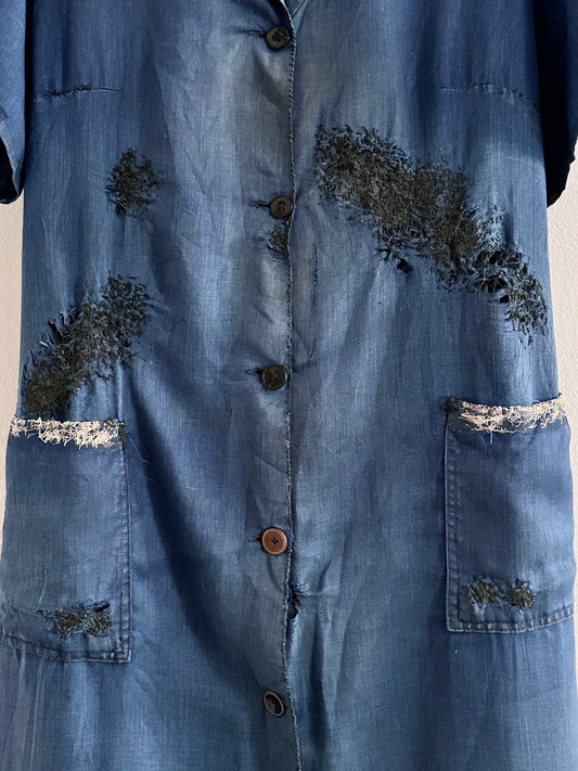 A work shirt with chaotic repairs