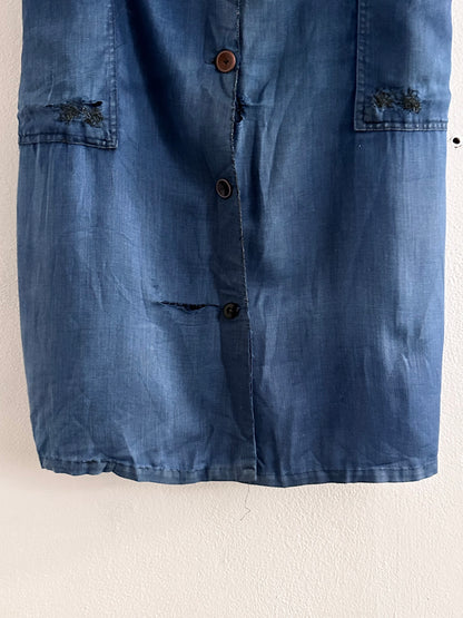 A work shirt with chaotic repairs