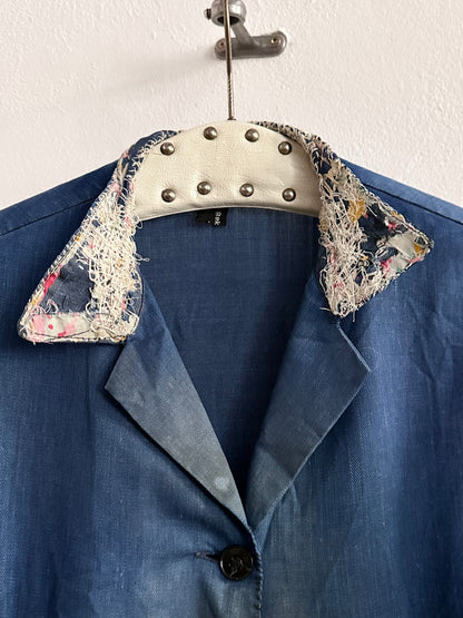 A work shirt with chaotic repairs