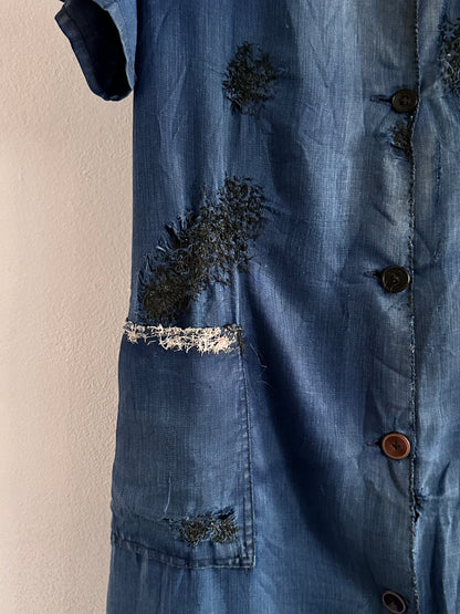 A work shirt with chaotic repairs