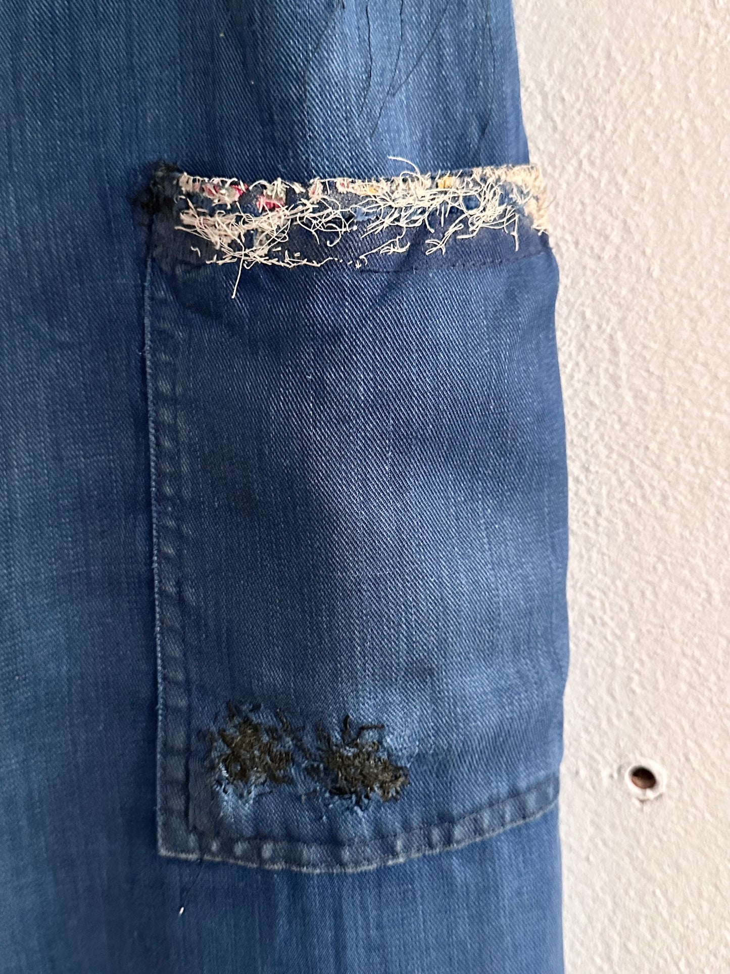 A work shirt with chaotic repairs