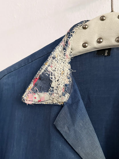 A work shirt with chaotic repairs