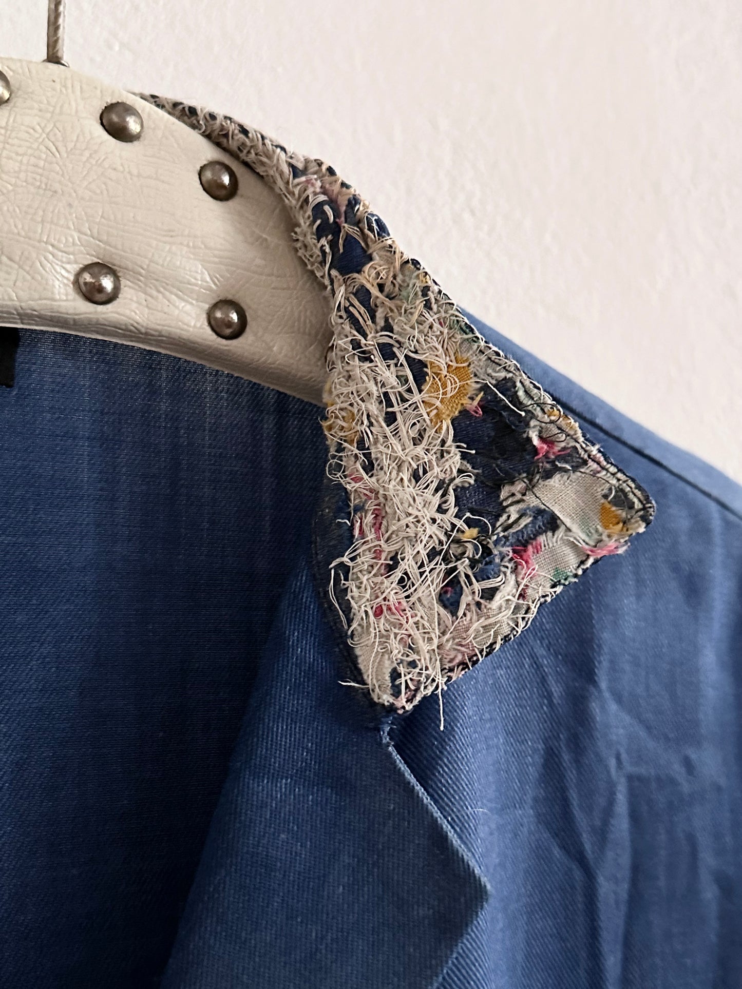 A work shirt with chaotic repairs