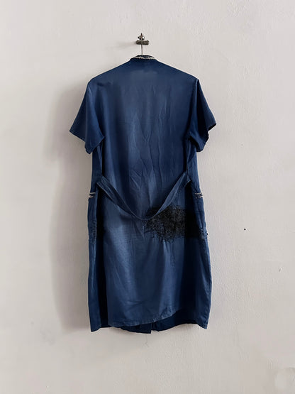 A work shirt with chaotic repairs