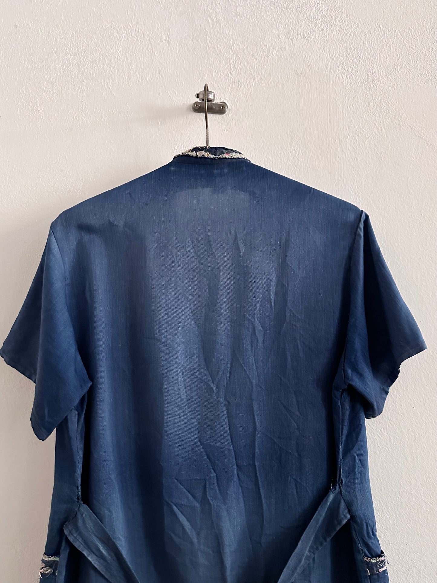 A work shirt with chaotic repairs
