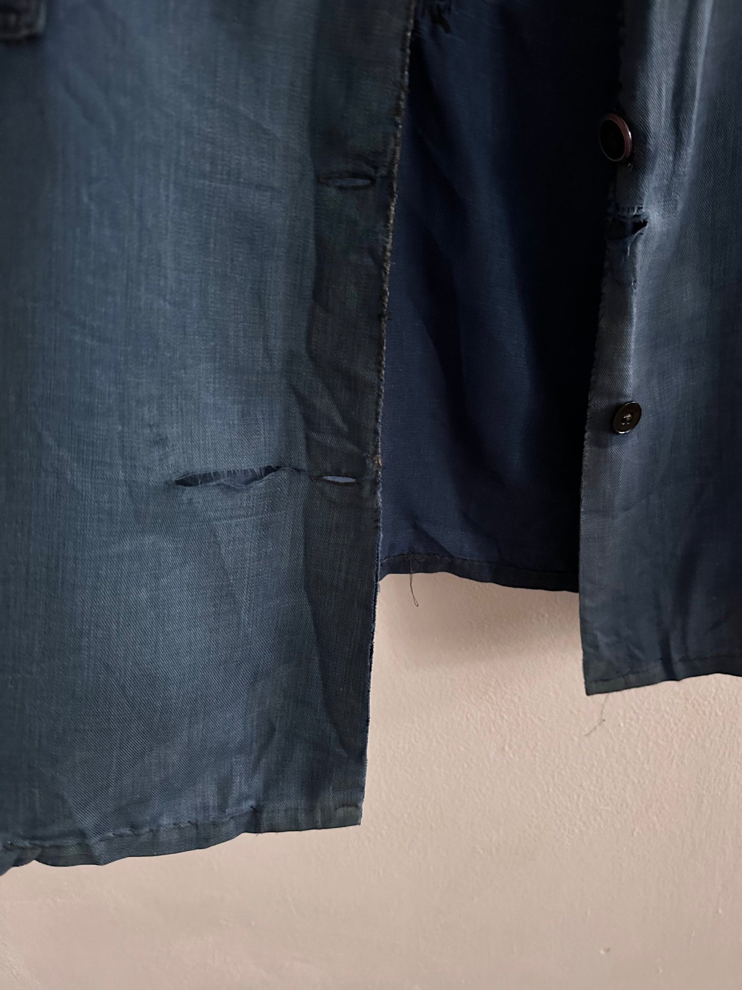 A work shirt with chaotic repairs