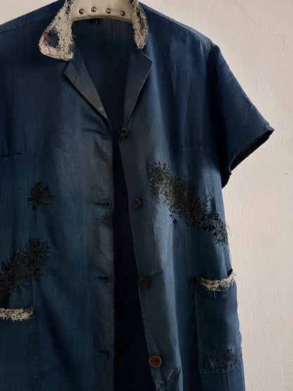 A work shirt with chaotic repairs