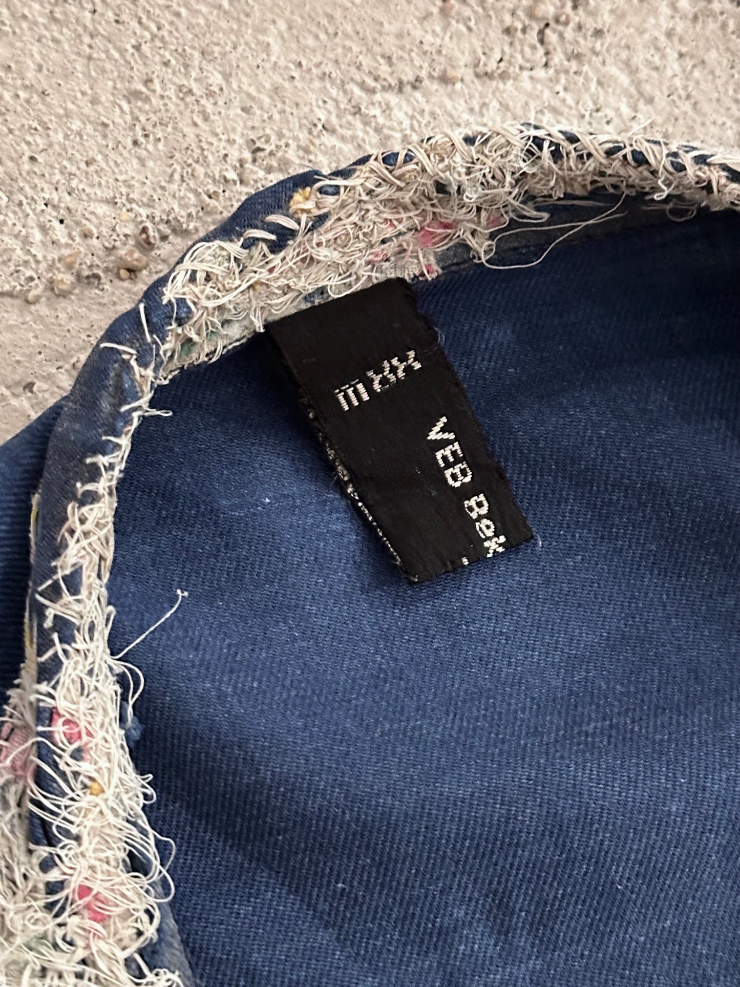 A work shirt with chaotic repairs