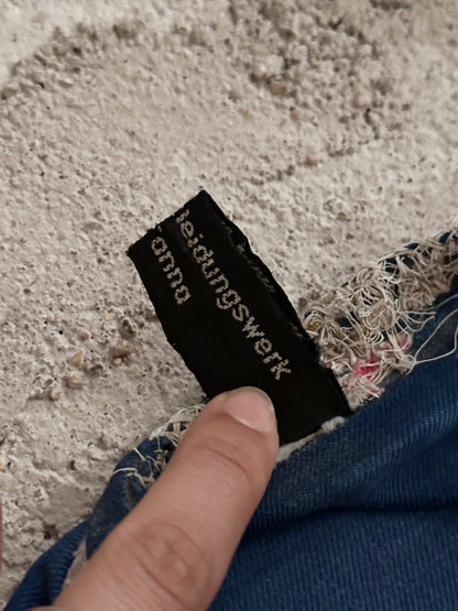 A work shirt with chaotic repairs