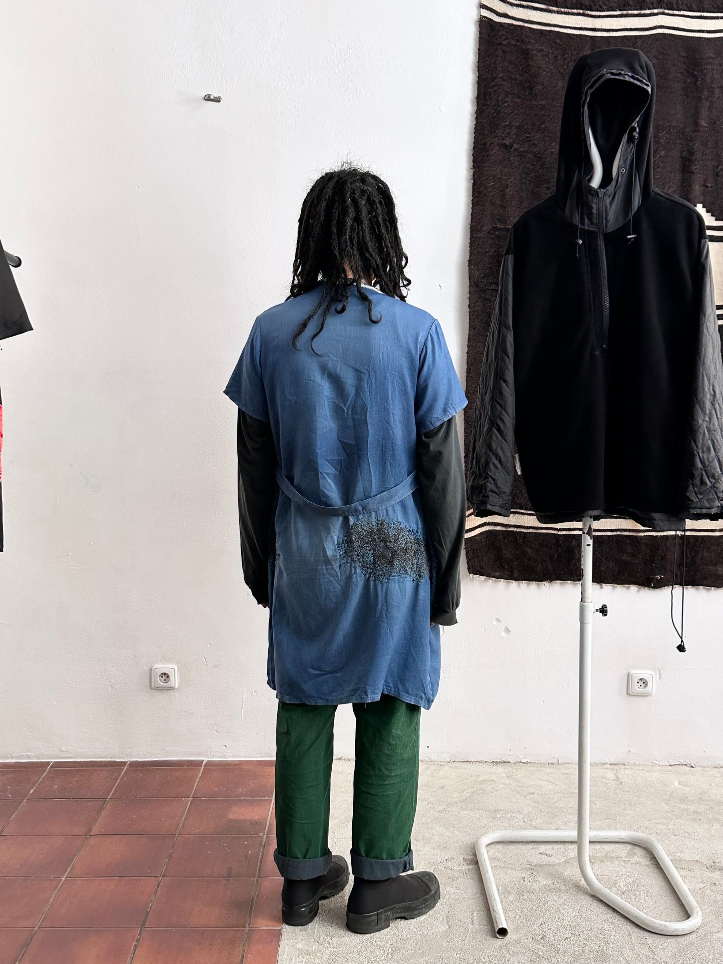 A work shirt with chaotic repairs